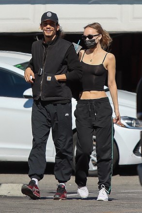 Los Angeles, CA  - *EXCLUSIVE*  - Young actress and model Lily-Rose Depp snapped with French rapper Yassine Stein as they arrive at Astro Burger for lunch.  Depp reportedly started dating Stein last September.  He’s the latest in a string of the starlet’s romances. Just three months earlier she was caught partaking in a heavy makeout session with actor Austin Butler while in London.  Prior to that, the young Depp was in a relationship with her “The King” co-star, Timothée Chalamet. The two made headlines several times for an endless array of PDA throughout their romance.Pictured: Lily-Rose Depp, Yassine SteinBACKGRID USA 6 FEBRUARY 2022 USA: +1 310 798 9111 / usasales@backgrid.comUK: +44 208 344 2007 / uksales@backgrid.com*UK Clients - Pictures Containing ChildrenPlease Pixelate Face Prior To Publication*