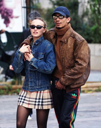 EXCLUSIVE: French model Lily-Rose Depp and her new boyfriend French Rapper Yassine Stein go for a long walk in Paris. 11 Oct 2021 Pictured: Lily-Rose Depp and Yassine. Photo credit: Love Paris / MEGA TheMegaAgency.com +1 888 505 6342 (Mega Agency TagID: MEGA795740_026.jpg) [Photo via Mega Agency]