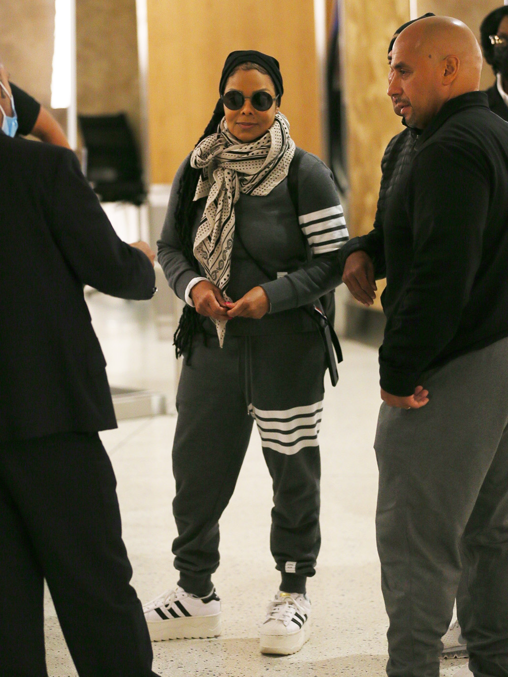 New York, NY - *EXCLUSIVE* - A smiling Janet Jackson is in high spirits as she takes off from JFK airport in New York. On pictured: Janet Jackson BACKGRID USA 8 MAY 2022 BYLINE MUST READ: T.JACKSON / BACKGRID USA: +1 310 798 9111 / usasales@backgrid.com UK: +44 208 344 2007 / uksales@backgrid.com *UK Customers - Images containing children, please rasterize the face before posting*