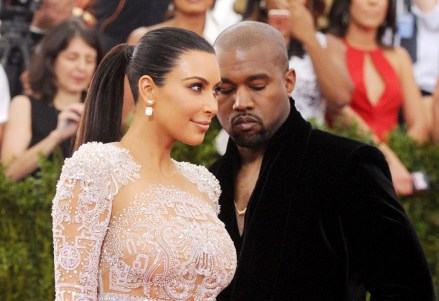 Kim Kardashian West, left, and Kanye West arrive at The Metropolitan Museum of Art's Costume Institute benefit gala in New York. Kardashian posted a tribute to West on Instagram to mark the couple's second wedding anniversary on May 24, 2016
People-Kim Kardashian-Kanye West, New York, USA - 4 May 2015