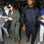 Kim Kardashian and Kanye West touch down in LA on their 2-year anniversary