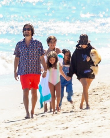 Malibu, CA  - Kourtney Kardashian and Scott Disick enjoy a day at the beach with their three children and go for a walk with their friend Luka Sabbat after some fun in the water.Pictured: Kourtney Kardashian, Scott Disick, Luka SabbatBACKGRID USA 19 JULY 2020 BYLINE MUST READ: NEMO / BACKGRIDUSA: +1 310 798 9111 / usasales@backgrid.comUK: +44 208 344 2007 / uksales@backgrid.com*UK Clients - Pictures Containing ChildrenPlease Pixelate Face Prior To Publication*