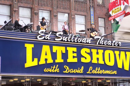 Paul McCartney
'The Late Show with David Letterman', New York, America - 15 Jul 2009
It was almost like January 1969 all over again, as Paul McCartney took to the top of the marquee of the Ed Sullivan Theatre for his performance last night on ‘The Late Show with David Letterman’ – a performance reminiscent of the Beatles’ iconic rooftop performance 40 years on top of the Apple Studios on London’s Savile Row.

It also harked back to another moment 45 years ago when the Beatles made their first American appearance at that same Ed Sullivan Theater.

Aptly, McCartney played the same song that his old band performed three times on top of the Apple Studios, ‘Get Back’, fittingly followed by one of his new songs, ‘Sing The Changes’, from his latest album, ‘Electric Arguments’, much to the delight of the assembled fans on the street down below, before chatting to host Letterman about that first US appearance and his relationship with the late Michael Jackson.
