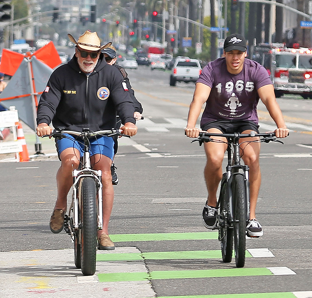 Arnold Schwarzenegger Bike Riding With Son Joseph Baena In Santa Monica