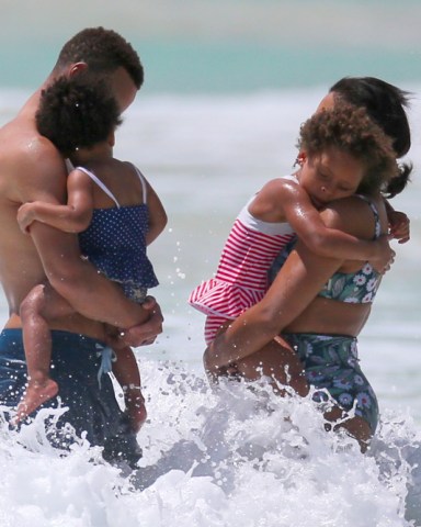 Kailua, HI  - *EXCLUSIVE*  - NBA superstar Stephen Curry and his family were seen enjoying a lovely day on the beach in Kailua, Hawaii. Steph enjoyed a couple of beers before going for a swim with his wife Ayesha and their two daughters Ryan and Riley.

Pictured: Stephen Curry, Ayesha Curry, Ryan Curry, Riley Curry

BACKGRID USA 22 JUNE 2017 

USA: +1 310 798 9111 / usasales@backgrid.com

UK: +44 208 344 2007 / uksales@backgrid.com

*UK Clients - Pictures Containing Children
Please Pixelate Face Prior To Publication*