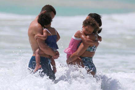 Kailua, HI  - *EXCLUSIVE*  - NBA superstar Stephen Curry and his family were seen enjoying a lovely day on the beach in Kailua, Hawaii. Steph enjoyed a couple of beers before going for a swim with his wife Ayesha and their two daughters Ryan and Riley.Pictured: Stephen Curry, Ayesha Curry, Ryan Curry, Riley CurryBACKGRID USA 22 JUNE 2017 USA: +1 310 798 9111 / usasales@backgrid.comUK: +44 208 344 2007 / uksales@backgrid.com*UK Clients - Pictures Containing ChildrenPlease Pixelate Face Prior To Publication*