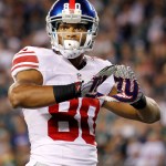 New York Giants wide receiver Victor Cruz (80) celebrates his touchdown against the Philadelphia Eagles during an NFL football game Sunday, Sept. 30, 2012, in Philadelphia. (AP Photo/Mel Evans)