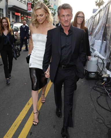 Charlize Theron and Sean Penn seen at the Warner Bros. premiere of "Mad Max: Fury Road", in Los Angeles Warner Bros. Premiere of "Mad Max: Fury Road", Los Angeles, USA