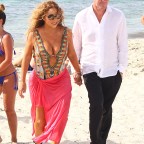 Mariah Carey and James Packer arriving on the beach in Formentera