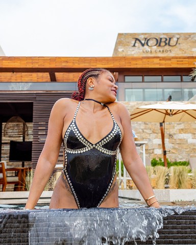 Taraji P. Henson looked a complete knockout as she lived it up during a romantic Valentine’s weekend with her fiancé Kelvin Hayden. The 49-year-old actress slipped into a daring black bejeweled swimsuit and enjoyed some quality time with Kelvin — who she is set to wed on April 4 — at Nobu Hotel Los Cabos. The lovebirds took a break from freezing cold Chicago where she is shooting the spin-off to her hit show Empire.   The Oscar-winning actress and retired NFL player arrived at their private ocean view suite where they were welcomed with a Nobu signature cocktail and specially prepared dessert to celebrate the Valentine’s Day weekend. The couple kicked off their lovers’ escape with a romantic boat tour of the famous Cabo San Lucas Arch where they  dined on lobster, oysters and chocolate covered strawberries as they toasted to their upcoming nuptials. After their sunset cruise, the two enjoyed a candlelit dinner at Nobu Restaurant where they dined on signature dishes such as Salmon tartare with caviar, Octopus Tiradito, Crispy Rice with Spicy Tuna, miso black cod and yellowtail sashimi to name a few. Taraji took to her Instagram to show off  her heart shaped strawberry that she fed to her fiancé. The next day the loving couple started their morning with freshly prepared breakfast from Malibu Farm before retreating to the adults only infinity pool. The duo spent the day lounging by the pool with friends and graciously taking photos with fans. Generous Taraji even bought the whole pool a round of cocktails. In the early afternoon they headed to Esencia Spa where they took advantage of the outdoor hydrotherapy garden, experiential shower, cabana jacuzzi and hydrotherapy pool before they went in for their couple’s massage and facials. Kelvin was also spotted working out of the state-of-the-art gym while Taraji was snapping pictures to commemorate her first time at Nobu Hotel Los Cabos. Nobu Restaurant pulled out all the stops for their next dinner date w