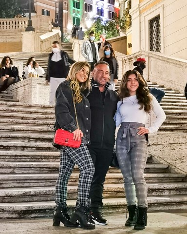 EXCLUSIVE: Joe Giudice and his daughters Gia and Milania are spotted enjoyng a holiday in Rome with an unidentified woman. They enjoy a lunch alfresco then go for a shopping spree in the fashion district of the eternal city before stopping in Spanish Steps for some selfies. 07 Nov 2020 Pictured: Joe Giudice, Gia Giudice, Milania Giudice. Photo credit: MEGA TheMegaAgency.com +1 888 505 6342 (Mega Agency TagID: MEGA713716_003.jpg) [Photo via Mega Agency]