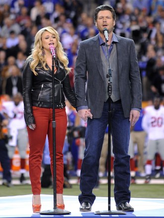 Husband and Wife Country Singers Miranda Lambert (l) and Blake Shelton (r) Sing During the Pregame Show in Lucas Oil Stadium Prior to Super Bowl Xlvi Between the New England Patriots and the New York Giants in Indianapolis Indiana Usa 05 February 2012 the Super Bowl is Annual Championship of the National Football League United States Indianapolis
Usa American Football Super Bowl Xlvi - Feb 2012