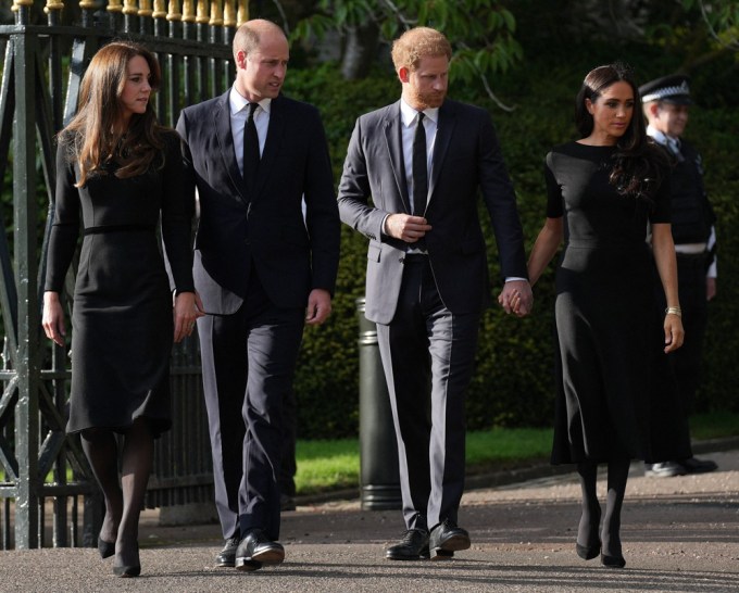 Prince and Princess of Wales along with Prince Harry and Meghan Markle the Duke and Duchess of Sussex looking at Floral Tributes and meeting well wishers at Windsor Castle