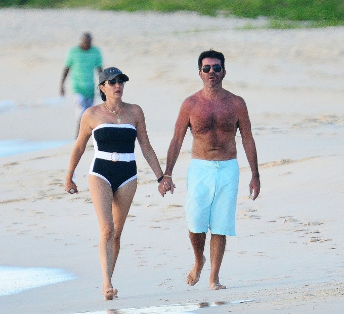 Simon Cowell Strolls on the Beach