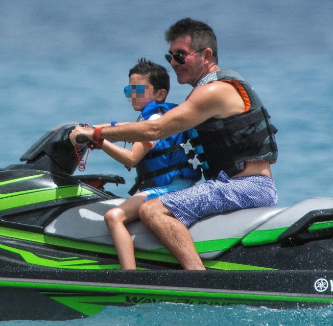 Simon Cowell jet skis in Barbados with his son