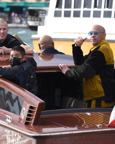 Vin Diesel and his family spotted out in Venice for Dolce and Gabbana show.  Pictured: Vincent Sinclair,Vin Diesel Ref: SPL5250048 300821 NON-EXCLUSIVE Picture by: venezia2020/IPA / SplashNews.com  Splash News and Pictures USA: +1 310-525-5808 London: +44 (0)20 8126 1009 Berlin: +49 175 3764 166 photodesk@splashnews.com  World Rights, No France Rights, No Italy Rights, No Spain Rights