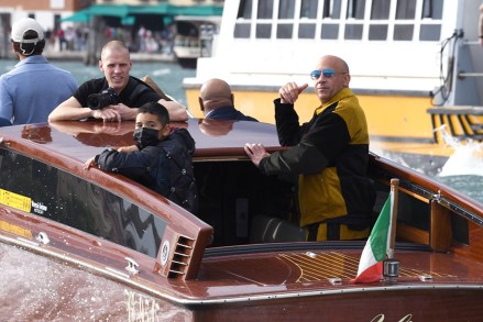 Vin Diesel and his family spotted out in Venice for Dolce and Gabbana show.Pictured: Vincent Sinclair,Vin DieselRef: SPL5250048 300821 NON-EXCLUSIVEPicture by: venezia2020/IPA / SplashNews.comSplash News and PicturesUSA: +1 310-525-5808London: +44 (0)20 8126 1009Berlin: +49 175 3764 166photodesk@splashnews.comWorld Rights, No France Rights, No Italy Rights, No Spain Rights