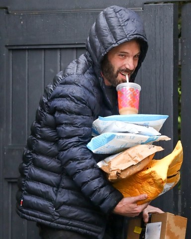 Los Angeles, CA - Ben Affleck grabs some packages that were delivered to his house while sipping on his morning coffee.Pictured: Ben AffleckBACKGRID USA 23 JANUARY 2021 BYLINE MUST READ: BACKGRIDUSA: +1 310 798 9111 / usasales@backgrid.comUK: +44 208 344 2007 / uksales@backgrid.com*UK Clients - Pictures Containing ChildrenPlease Pixelate Face Prior To Publication*