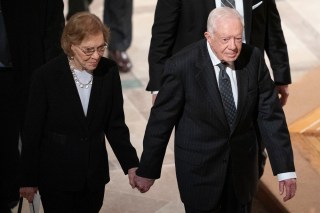 Jimmy Carter, Rosalynn Carter. Former President Jimmy Carter, and Rosalynn Carter hold hands as they walk from a State Funeral for former President George H.W. Bush at the National Cathedral, in Washington
George HW Bush, Washington, USA - 05 Dec 2018