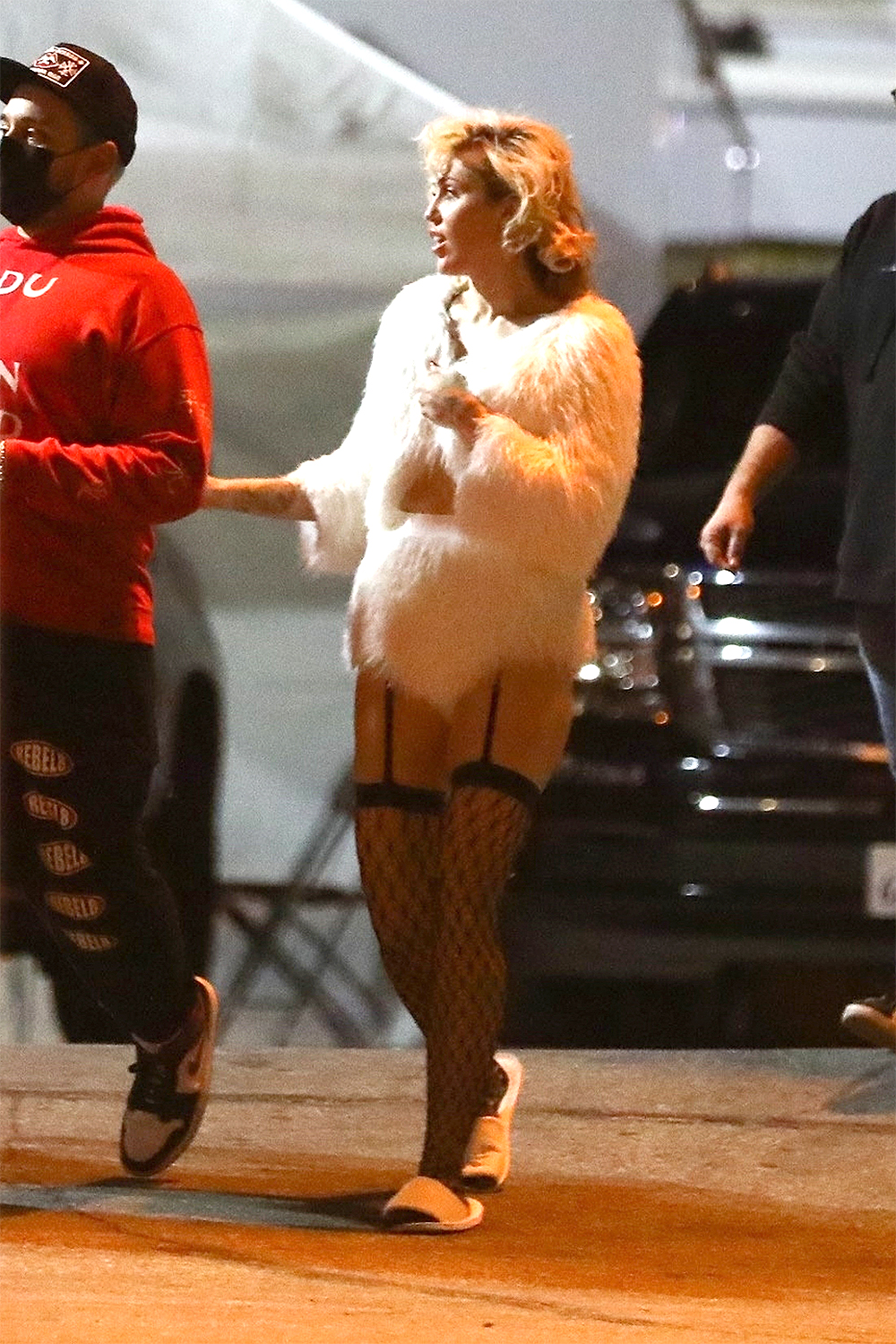 *EXCLUSIVE* Miley Cyrus spotted In sexy thigh high fishnet stockings as she heads to shoot a new project Wednesday at the Hollywood Palladium!