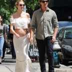 Candice Swanepoel shows off her pregnant belly as she walks with boyfriend in NYC