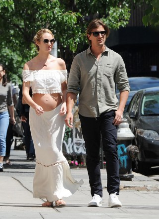 Candice Swanepoel shows off her pregnant belly as she walks with boyfriend Hermann Nicoli in New York City.Pictured: Candice Swanepoel and boyfriend Hermann Nicoli,Candice Swanepoelboyfriend Hermann NicoliRef: SPL1286817 200516 NON-EXCLUSIVEPicture by: SplashNews.comSplash News and PicturesLos Angeles: 310-821-2666New York: 212-619-2666London: +44 (0)20 7644 7656Berlin: +49 175 3764 166photodesk@splashnews.comWorld Rights