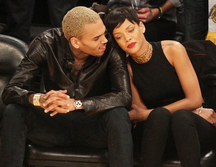 Chris Brown and Rihanna laugh and snuggle as they make  their 1st public appearance together since their very public break up as they attend the Los Angeles Lakers Vs The New York Knicks Basketball Game at the Staoles Center in Los Angeles, CaPictured: Chris Brown and Rihanna,Chris BrownRihannaRef: SPL474572 261212 NON-EXCLUSIVEPicture by: SplashNews.comSplash News and PicturesLos Angeles: 310-821-2666New York: 212-619-2666London: +44 (0)20 7644 7656Berlin: +49 175 3764 166photodesk@splashnews.comWorld Rights