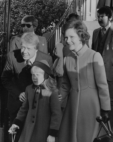 President-elect Jimmy Carter with wife Rosalynn and daughter Amy Carter on Inauguration Day. Jan. 20, 1977  (BSLOC_2016_14_110)