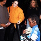 Kendall Jenner And Friends Buy Some Candy From A Young Street Vendor As She And Dad Caitlyn Jenner Head To The Clippers Game At Crypto.com Arena In Los Angeles, CA
