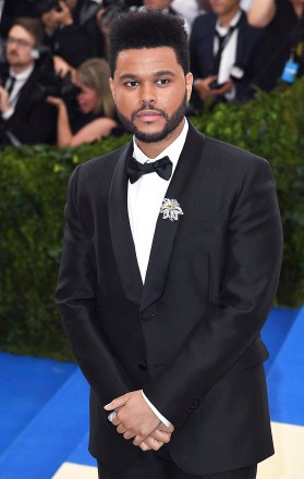 NOVEMBER 25, 2020: The Weeknd accuses the Grammy Awards and the Recording Academy of being corrupt after receiving no Grammy Award nominations for his album "After hours" or your single "blinding lights".  He and his management team maintain that because he had agreed to perform during the 2021 Superbowl, and thus was unable to perform during the Grammy Awards, he was excluded from any consideration for any Grammy Awards.  - File photo from: zz/DP/AAD/STAR MAX/IPx 2017 5/1/17 The Weeknd at the 2017 Costume Institute Gala - "Rei Kawakubo/Comme des Garçons: The Art of the In-Between" held on May 1, 2017 at the Metropolitan Museum of Art in New York City.  (NEW YORK)