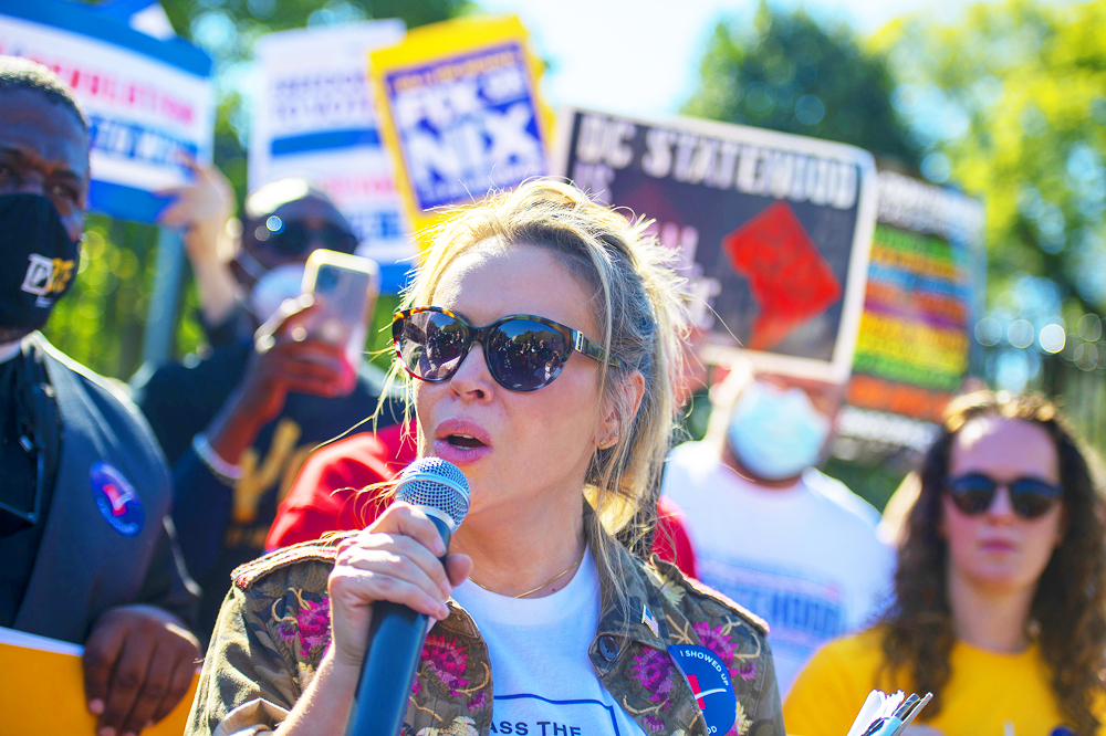 Actress and Board Member of People For the American Way Alyssa Milano speaks during a protest sponsored by The League of Women Voters, People for the American Way and Declaration for American Democracy Coalition to put pressure on the Biden Administration to take action on voting rights and end the filibuster outside the White House in Washington, DC., on Tuesday, October 19, 2021.Protest Gathers Outside The White House in Support of Voting Rights, Washington, District of Columbia, United States - 19 Oct 2021