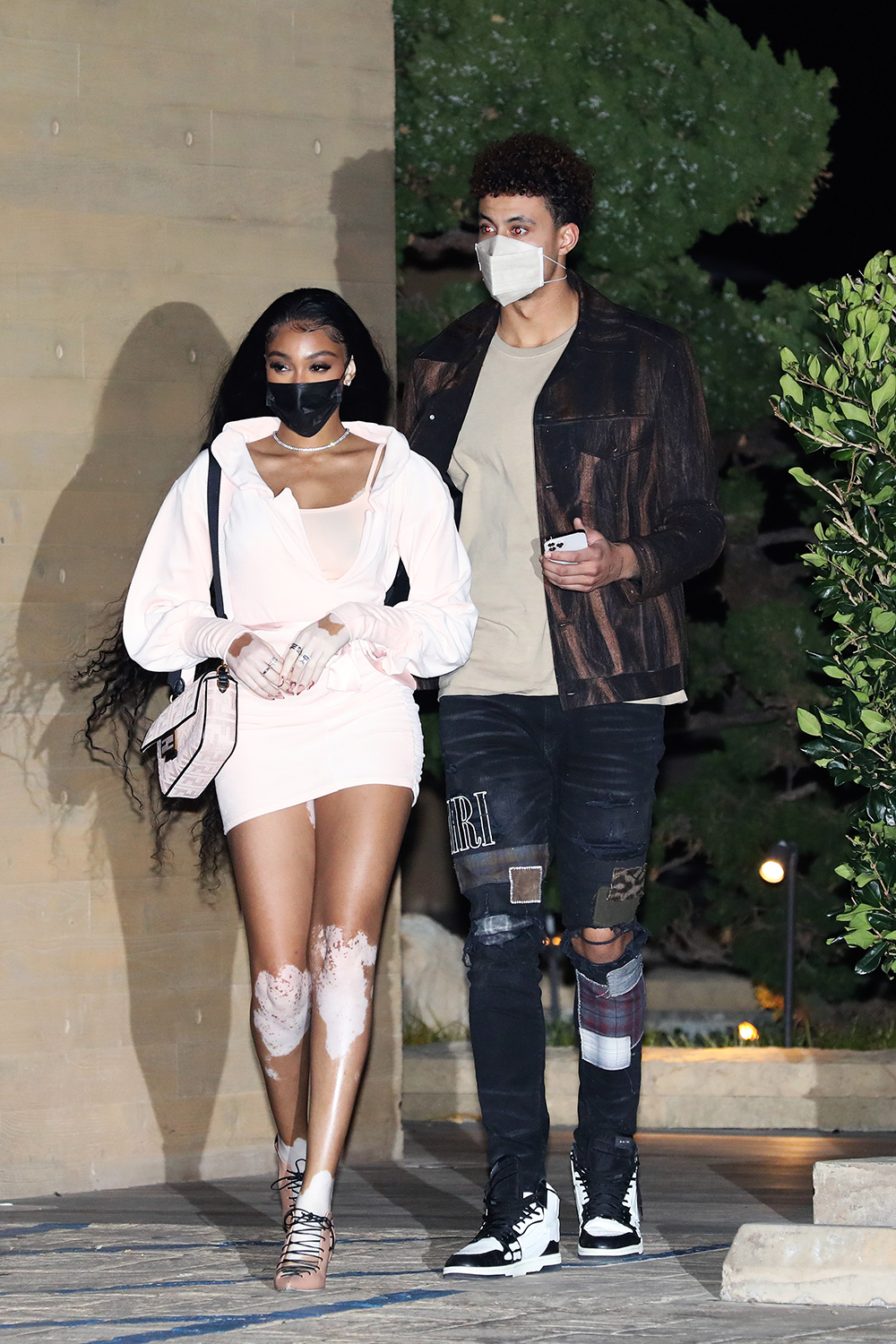 Winnie Harlow and Kyle Kuzma have a romantic dinner date at Nobu Malibu in Malibu. 17 Feb 2021 Pictured: Winnie Harlow and Kyle Kuzma. Photo credit: Photographer Group/MEGA TheMegaAgency.com +1 888 505 6342 (Mega Agency TagID: MEGA734082_012.jpg) [Photo via Mega Agency]