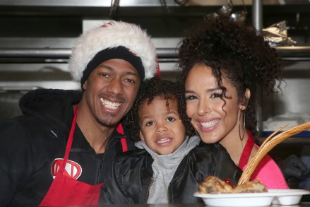Christmas Celebration On Skid Row held at Los Angeles Mission.  Photo Credit: FS/AdMediaPictured: Nick Cannon,Golden Cannon,Brittany BellRef: SPL5137200 231219 NON-EXCLUSIVEPicture by: FS/AdMedia / SplashNews.comSplash News and PicturesUSA: +1 310-525-5808London: +44 (0)20 8126 1009Berlin : +49 175 3764 166photodesk@splashnews.comWorld Rights