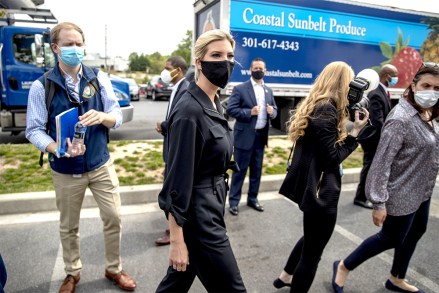 Ivanka Trump, the daughter of President Donald Trump, wears a mask as she speaks with employees following a tour of Coastal Sunbelt Produce, in Laurel, Md
Virus Outbreak Maryland, Laurel, United States - 15 May 2020