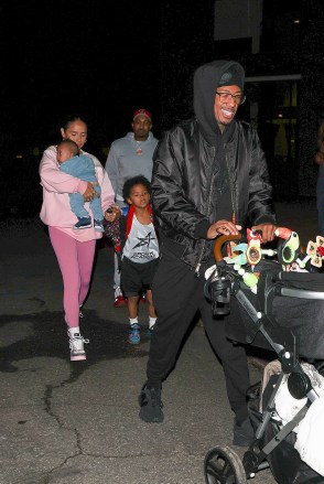 LOS ANGELES, CA - *SPECIAL* - Super Dad 12-year-old Nick Cannon is seen rolling in a double wheelchair while leaving his son's basketball game in Los Angeles. Photo: Nick Cannon BACKGRID USA January 6, 2023 USA: +1 310 798 9111 / ussales@backgrid.com  United Kingdom: +44 208 344 2007 / uksales@backgrid.com  *UK customers - pictures with children  Please create a face image before publishing*