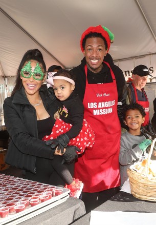 Los Angeles, CA - Brittany Bell, Powerful Queen Cannon, Nick Cannon and Golden Cannon at the Los Angeles Mission's Annual Christmas Feed-the-Homeless Event in Los Angeles.  Pictured: Brittany Bell, Powerful Queen Cannon, Nick Cannon and Golden Cannon BACKGRID USA 23 DECEMBER 2022 BYLINE MUST READ: MediaPunch / BACKGRID USA: +1 310 798 9111 / usasales@backgrid.com UK: +44 208 344 2007 / uksales@backgrid .com *UK Clients - Pictures Containing Children Please Pixelate Face Prior To Publication*