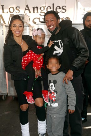 Los Angeles, CA - Brittany Bell, Powerful Queen Cannon, Nick Cannon and Golden Cannon at the Los Angeles Mission's Annual Christmas Feed-the-Homeless Event in Los Angeles.  Pictured: Brittany Bell, Powerful Queen Cannon, Nick Cannon and Golden Cannon BACKGRID USA 23 DECEMBER 2022 BYLINE MUST READ: MediaPunch / BACKGRID USA: +1 310 798 9111 / usasales@backgrid.com UK: +44 208 344 2007 / uksales@backgrid.com .com *UK Clients - Pictures Containing Children Please Pixelate Face Prior To Publication*