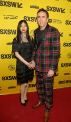Nicolas Cage, right, and his wife, Riko Shibata, arrive for the world premiere of "The Unbearable Weight of Massive Talent" at the Paramount Theatre during the South by Southwest Film Festival, in Austin, Texas
2022 SXSW - "The Unbearable Weight of Massive Talent", Austin, United States - 12 Mar 2022