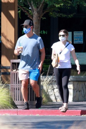 Thousand Oaks, CA  - *EXCLUSIVE*  - Actor Taylor Lautner seen eating Togos sandwiches and drinking Starbucks coffee with his girlfriend Tay in Thousand Oaks.  The couple seemed very happy and wore masks walking around but took them off once they sat down.Pictured: Taylor Lautner USA: +1 310 798 9111 / usasales@backgrid.comUK: +44 208 344 2007 / uksales@backgrid.com*UK Clients - Pictures Containing ChildrenPlease Pixelate Face Prior To Publication*BACKGRID USA 22 JUNE 2020 BYLINE MUST READ: Ability Films / BACKGRID