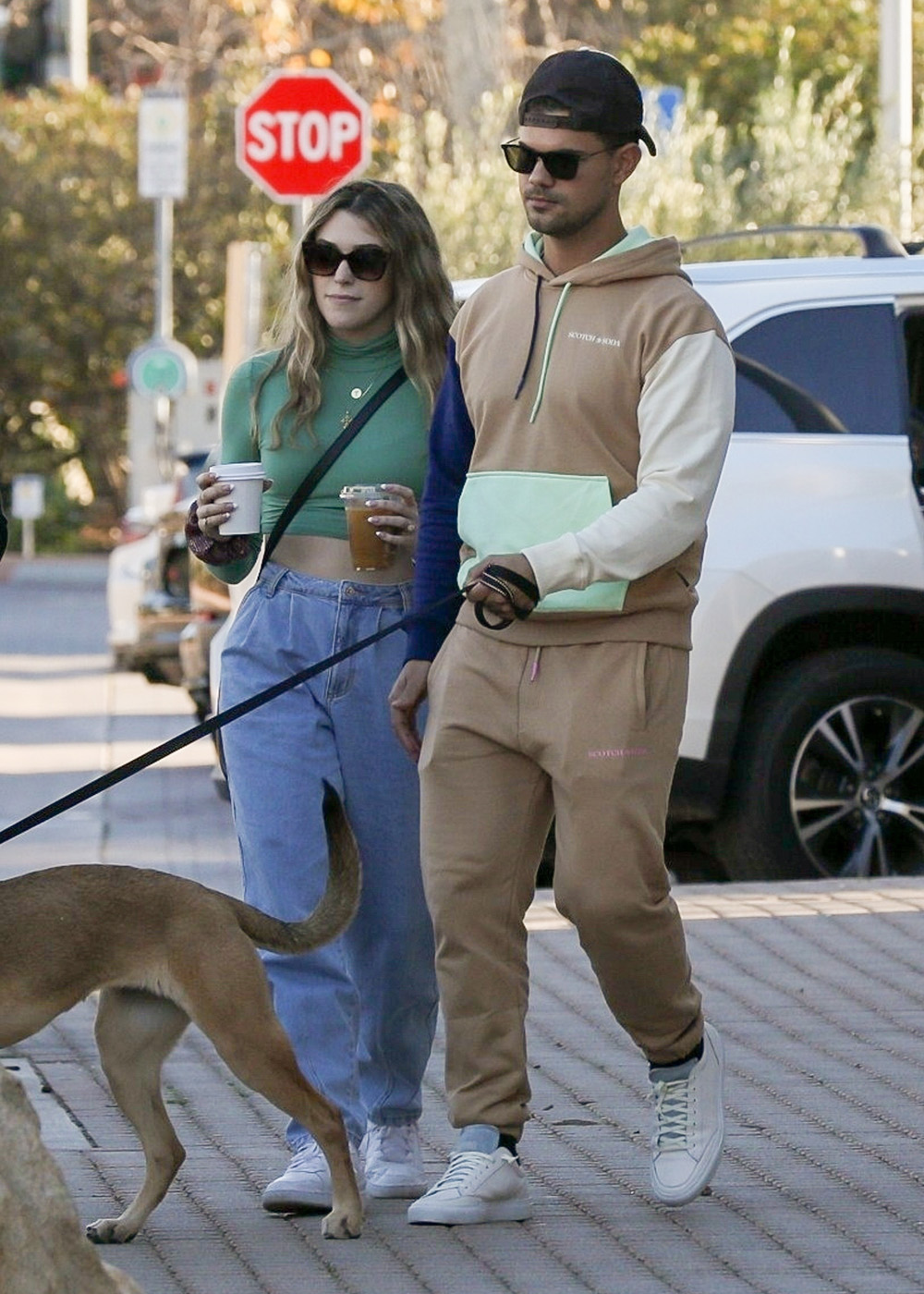 Malibu, CA - *EXCLUSIVE* Newly engaged Taylor Lautner and Tay Dome spend their afternoon grabbing coffee and shopping with their dog and friends in Malibu