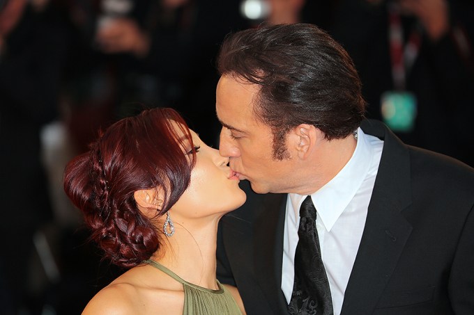 Nicolas Cage kisses then-wife Alice Kim Cage