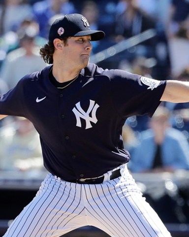 New York Yankees' Gerrit Cole delivers a pitch during the first inning of a spring training baseball game against the Detroit Tigers, in Tampa, Fla
Tigers Yankees Baseball, Tampa, USA - 29 Feb 2020