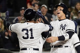 New York Yankees center fielder Aaron Hicks (31) celebrates with Aaron Judge after hitting a three-run home run against the Houston Astros during the first inning of Game 5 of baseball's American League Championship Series, in New York
ALCS Astros Yankees Baseball, New York, USA - 18 Oct 2019
