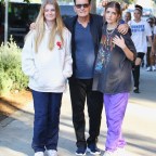 Charlie Sheen searched by security at the Billie Eilish concert and removes a clear container containing colored tablets