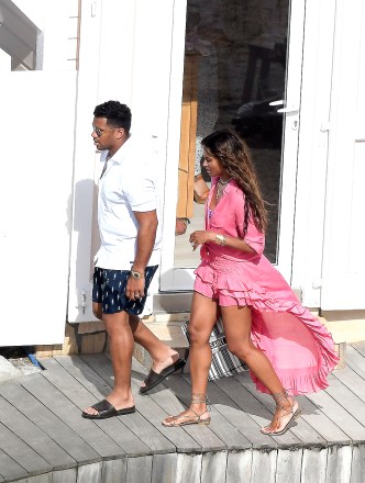 EXCLUSIVE: Ciara shows off her toned legs in a bright pink dress in St. Barts. 11 Mar 2022 Pictured: Ciara and Russell Wilson. Photo credit: Spread Pictures / MEGA TheMegaAgency.com +1 888 505 6342 (Mega Agency TagID: MEGA837534_018.jpg) [Photo via Mega Agency]