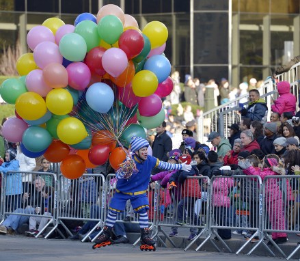 A Performer in the 89th Macy's Thanksgiving Day Parade Skates Past Spectators in New York Usa 26 November 2015 the Annual Parade Which Began in 1924 Features Giant Balloons of Characters From Popular Culture Floating Above the Streets of Manhattan United States New York
Usa Macys Thanksgiving Parade - Nov 2015
