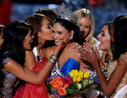 Other contestants congratulate Miss Philippines Pia Alonzo Wurtzbach after she was crowned Miss Universe at the Miss Universe pageant, in Las Vegas. According to the pageant, a misreading led the announcer to read Miss Colombia Ariadna Gutierrez as the winner before they took it away and gave it to Miss Philippines
Miss Universe Pageant, Las Vegas, USA