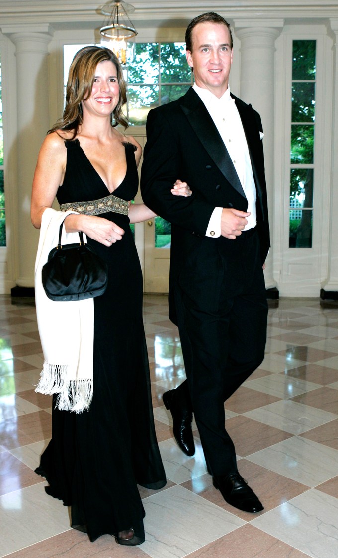 Peyton Manning and his wife at the White House