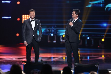 Ryan Seacrest, left, and Brian Dunkleman speak at the "American Idol" farewell season finale at the Dolby Theatre, in Los Angeles
"American Idol" Farewell Season Finale - Show, Los Angeles, USA