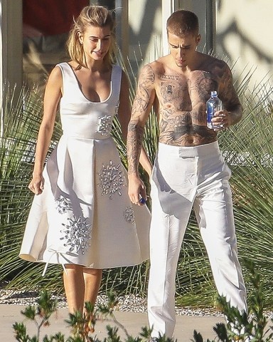 Hollywood, CA  - The fun continues for Justin Bieber and Hailey Baldwin as they don all white outfits for the next part of their photoshoot, which looked a bit reminiscent of wedding attire. In between takes, Justin could be seen entertaining Hailey and the crew by playing on his guitar.

Pictured: Justin Bieber, Hailey Baldwin

BACKGRID USA 4 DECEMBER 2018 

USA: +1 310 798 9111 / usasales@backgrid.com

UK: +44 208 344 2007 / uksales@backgrid.com

*UK Clients - Pictures Containing Children
Please Pixelate Face Prior To Publication*